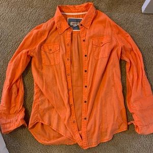 Orange button down shirt